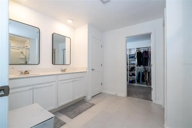 an aerial view of a house with a lake view