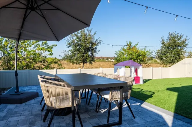 a view of a workspace with furniture