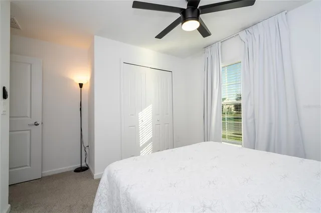 an aerial view of a house with a ocean view