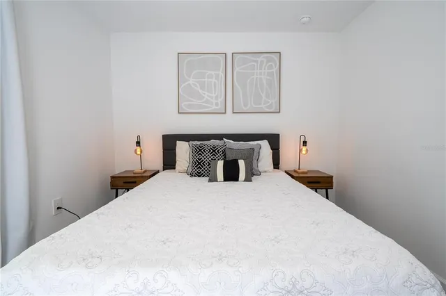 a view of swimming pool with outdoor seating