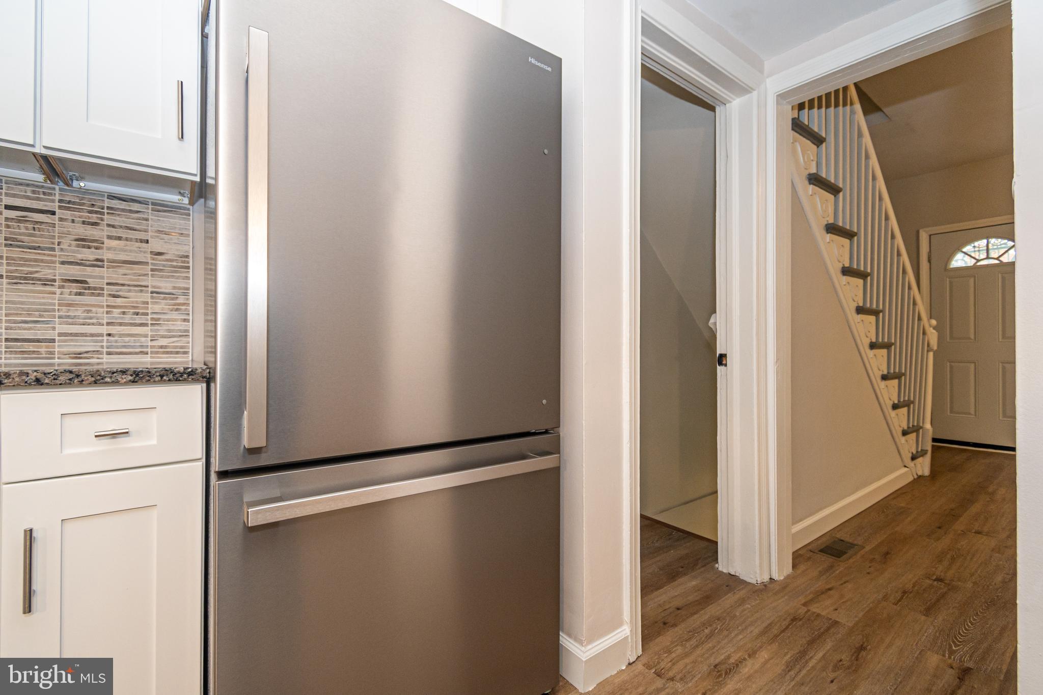 3716 Columbus Drive Baltimore, MD 21215 - Photo 12 of 36 a view of walk in closet with empty racks