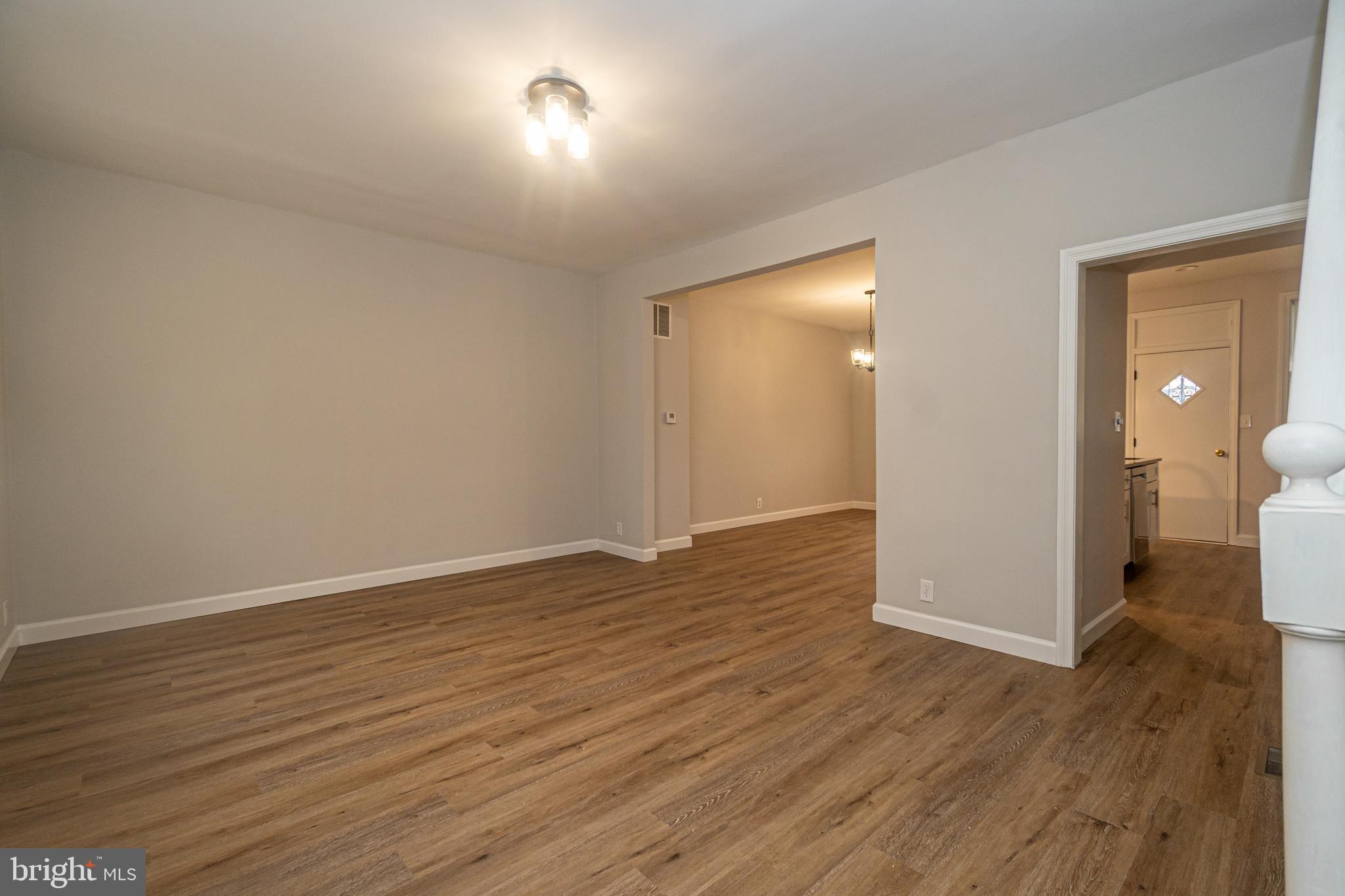 3716 Columbus Drive Baltimore, MD 21215 - Photo 24 of 36 a view of a room with wooden floor