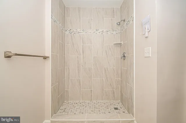 a view of a bathroom with shower