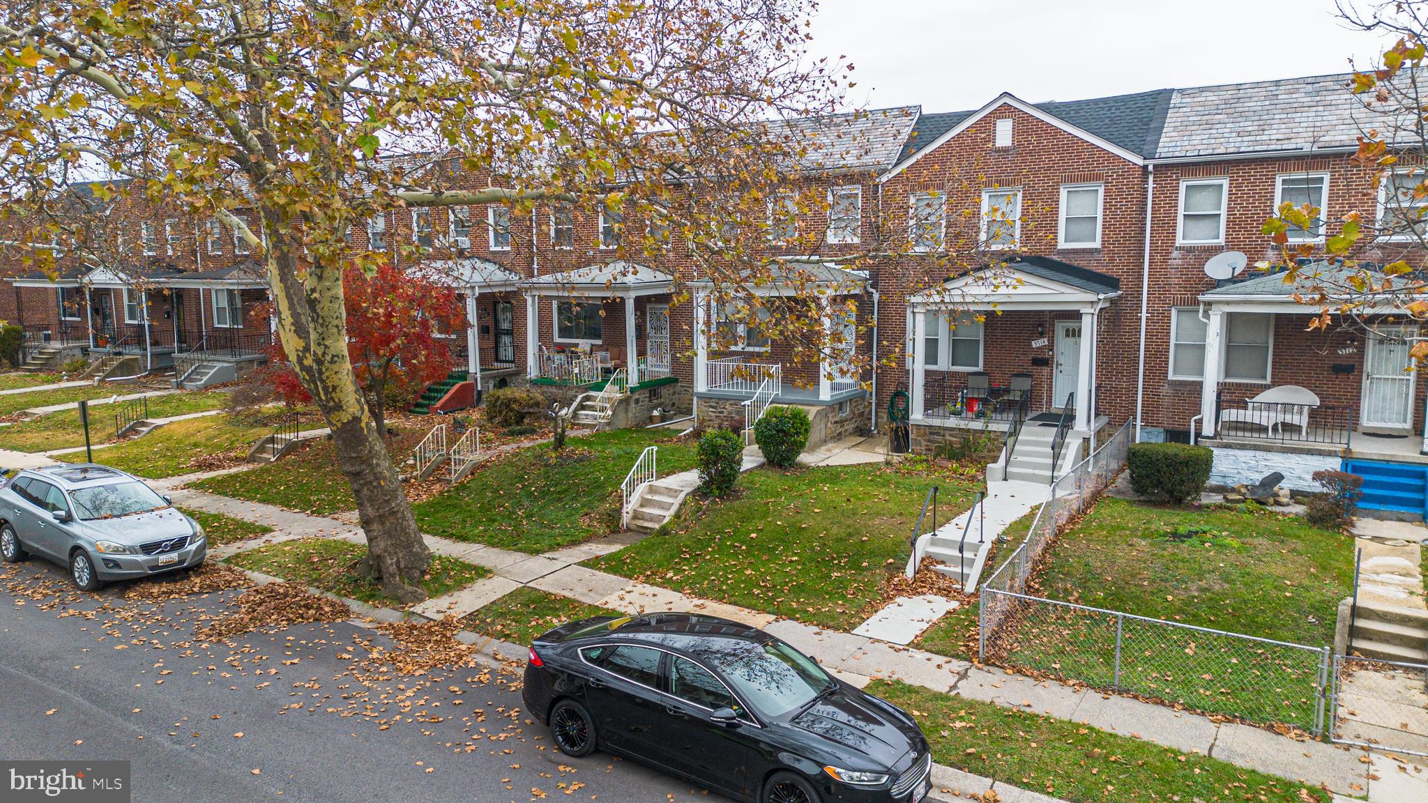 3716 Columbus Drive Baltimore, MD 21215 - Photo 3 of 36 front view of a house with a yard