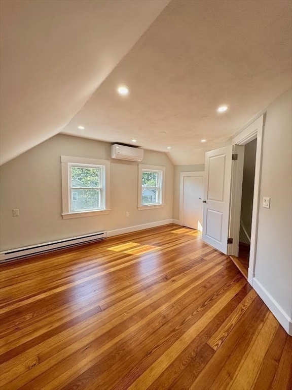 37 Fountain Road Arlington, MA 02476 - Photo 12 of 28 a view of an empty room with wooden floor and a window