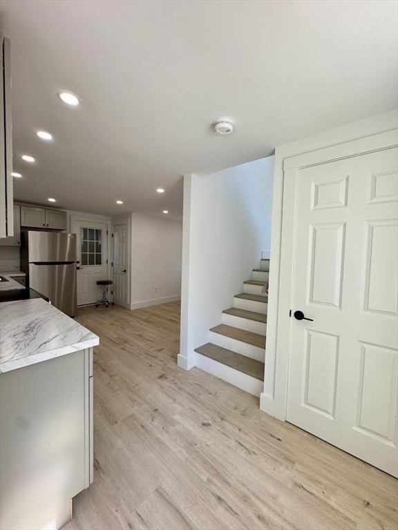 37 Fountain Road Arlington, MA 02476 - Photo 22 of 28 a view of a kitchen with a sink and a kitchen