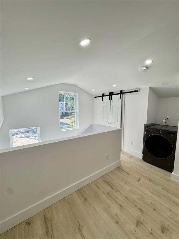 37 Fountain Road Arlington, MA 02476 - Photo 27 of 28 a view of an empty room with wooden floor and a window