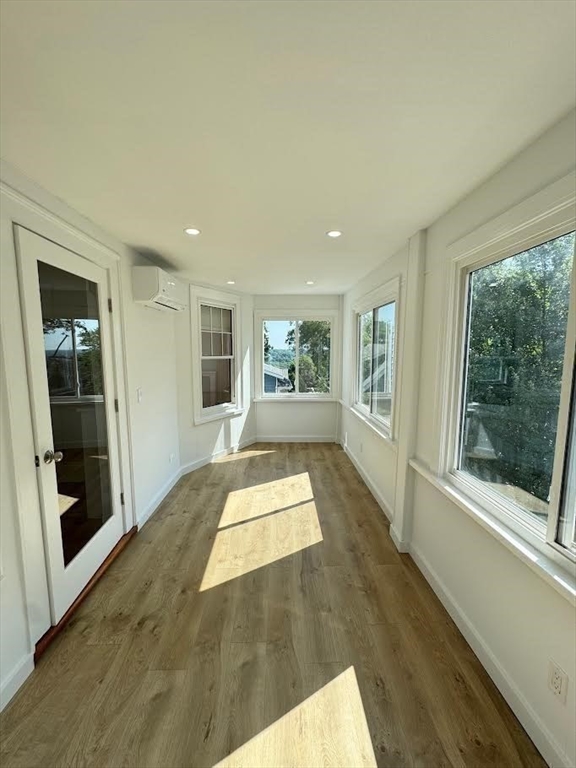 37 Fountain Road Arlington, MA 02476 - Photo 5 of 28 wooden floor in an empty room with a window