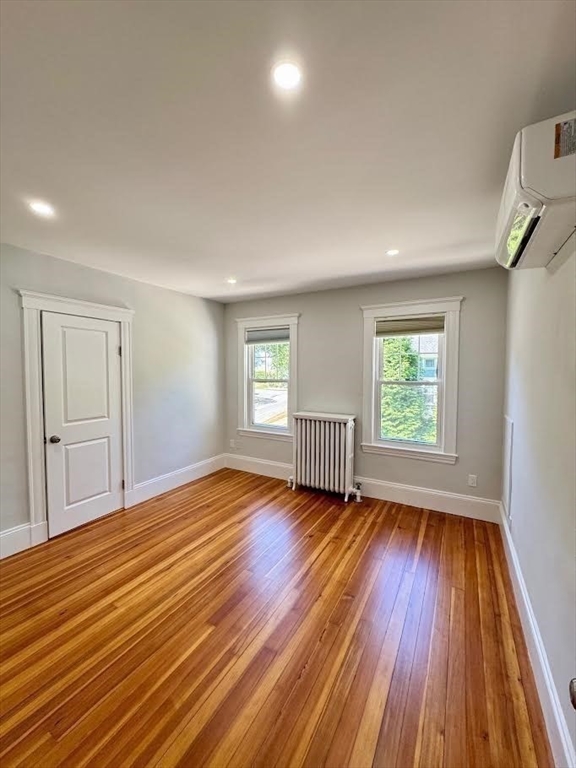 37 Fountain Road Arlington, MA 02476 - Photo 7 of 28 a view of an empty room with wooden floor and a window