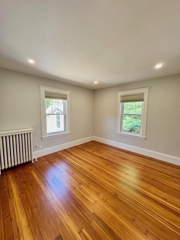 37 Fountain Road Arlington, MA 02476 - Photo 9 of 28 an empty room with wooden floor and windows