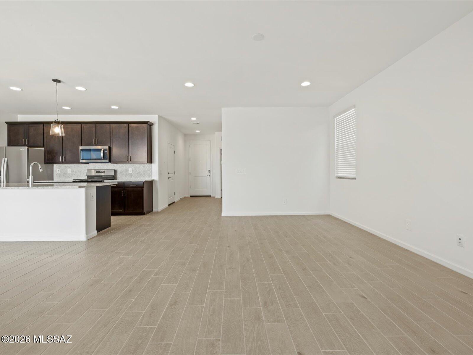 5133 West Gainer Ridge Road Tucson, AZ 85757 - Photo 7 of 16 a view of kitchen with a sink