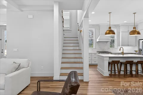 a view of a livingroom with furniture and closet