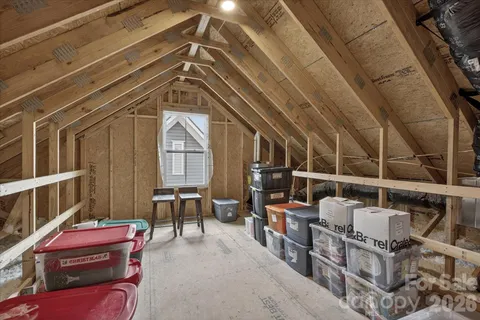 a view of a pathway both side of house
