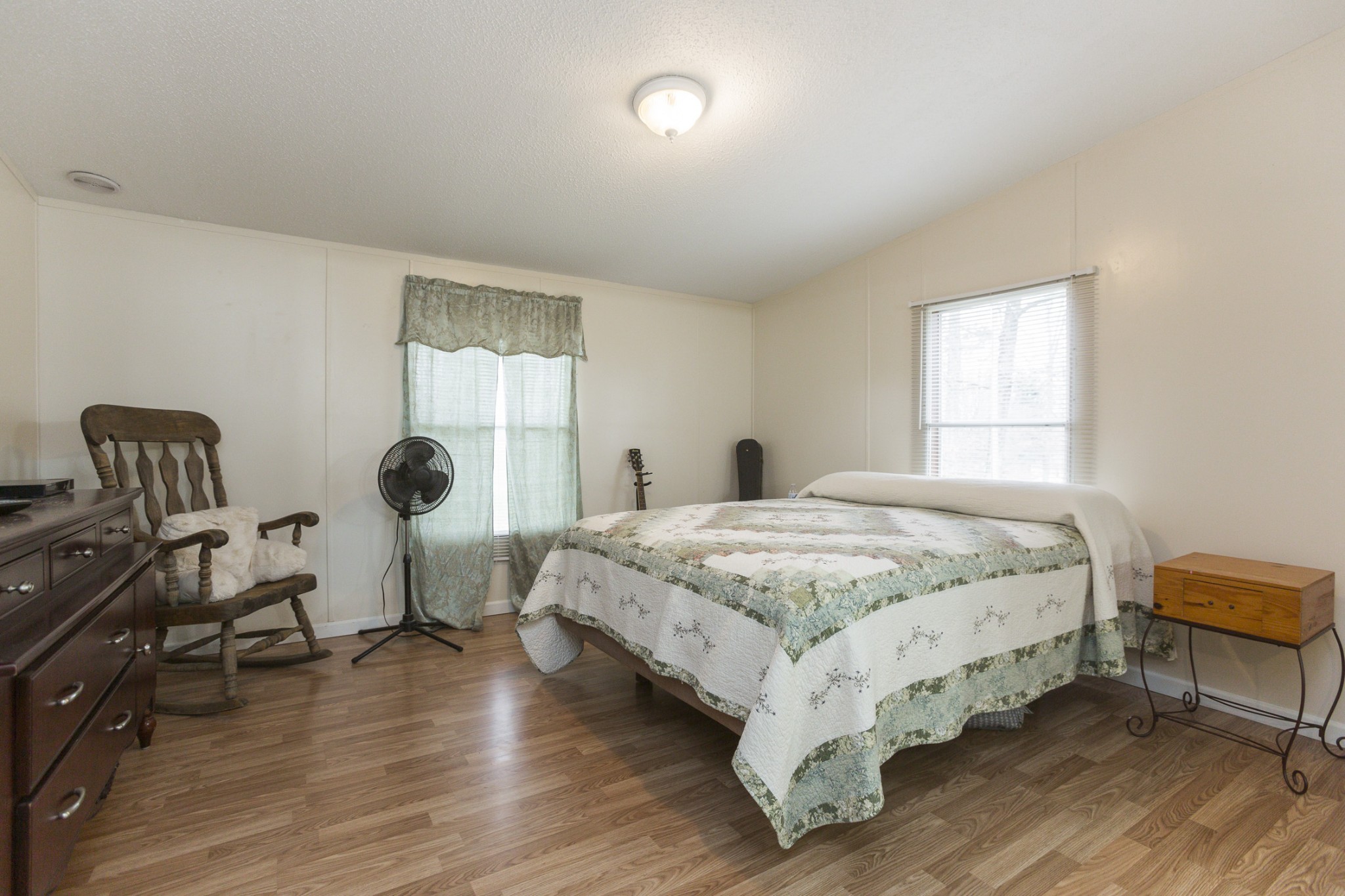2930 Ray W Road Springfield, TN 37172 - Photo 13 of 25 a bedroom with a bed a chair and a window