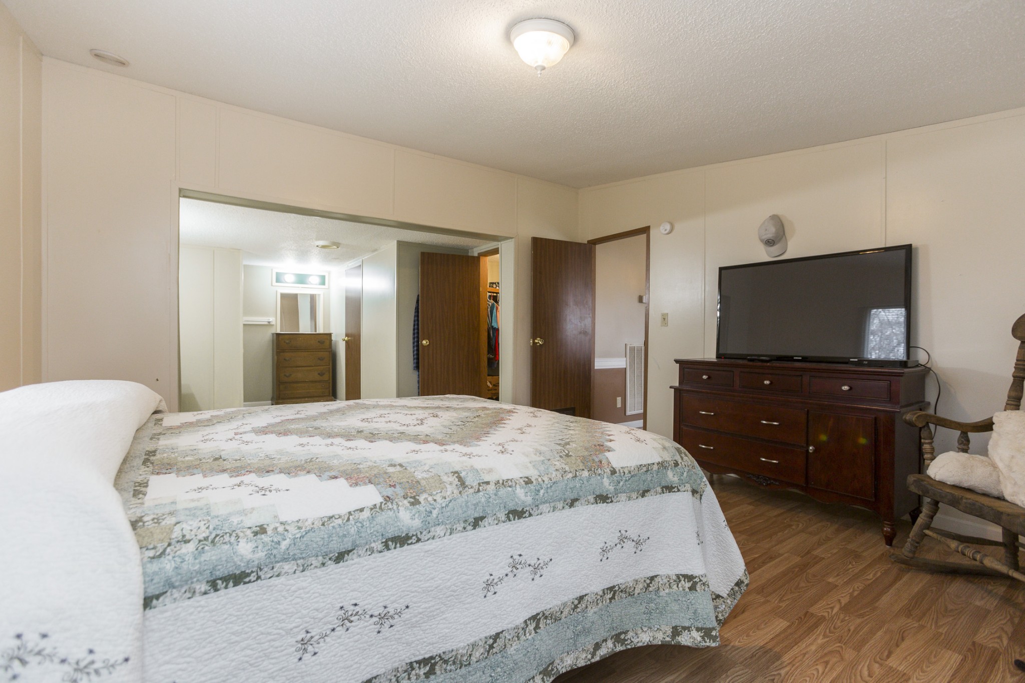 2930 Ray W Road Springfield, TN 37172 - Photo 14 of 25 a bedroom with a bed and a flat screen tv