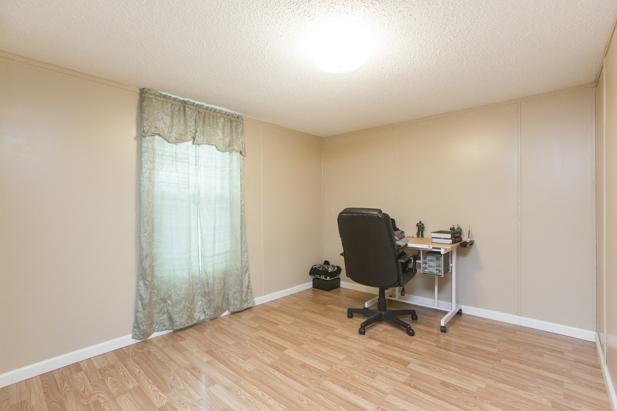 2930 Ray W Road Springfield, TN 37172 - Photo 17 of 25 a view of a workspace with furniture and a window