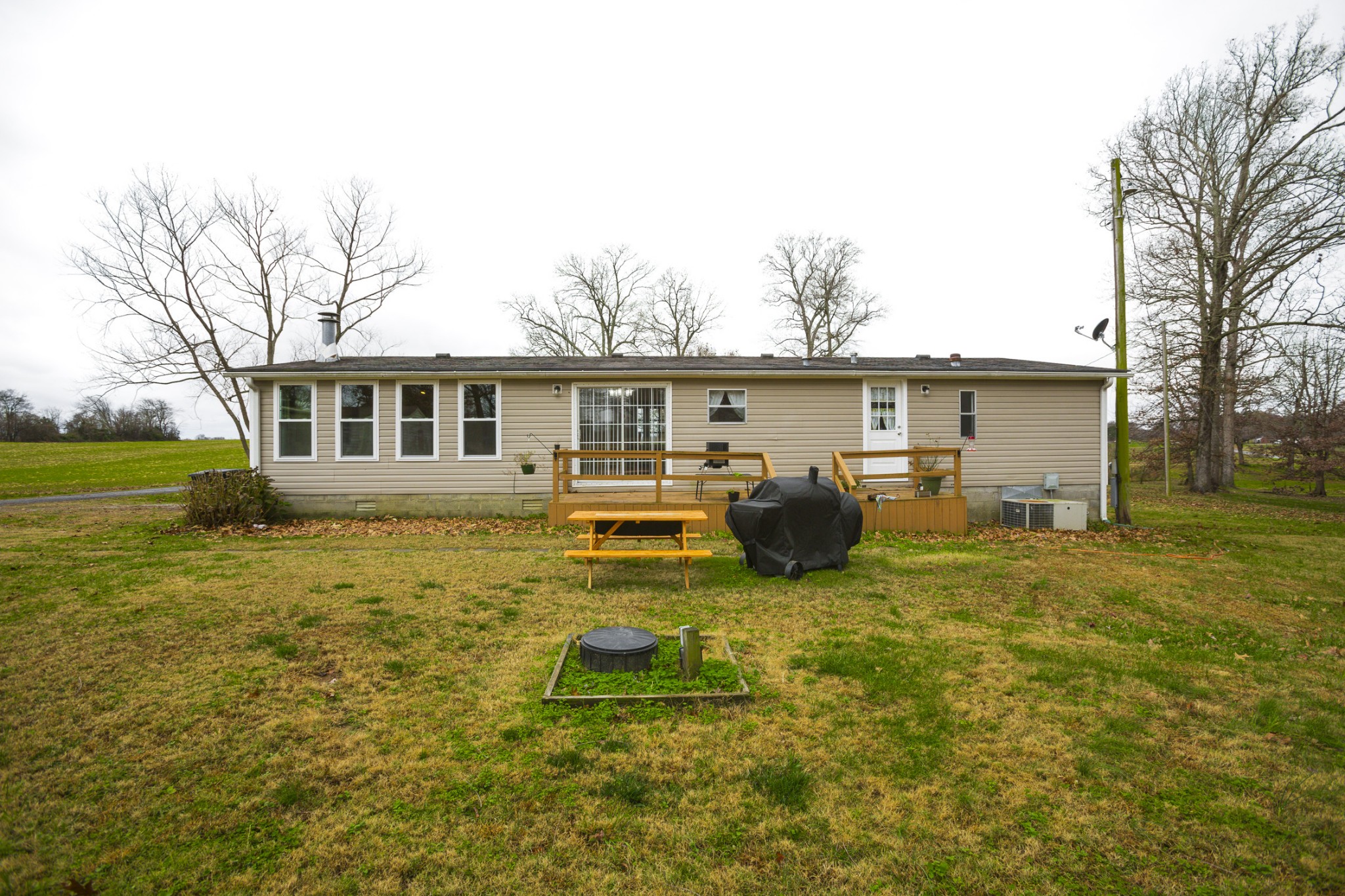 2930 Ray W Road Springfield, TN 37172 - Photo 23 of 25 a backyard of a house with table and chairs