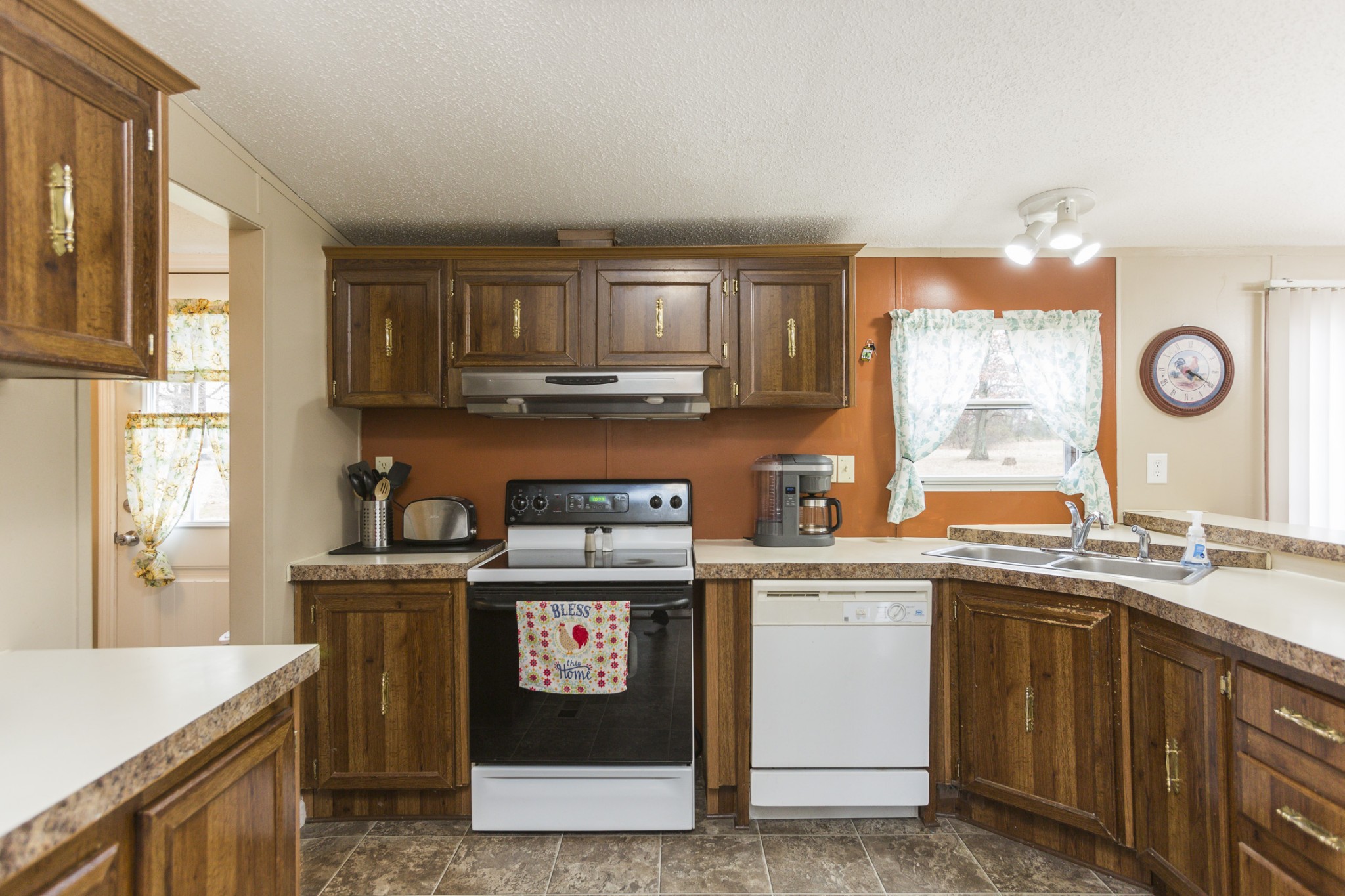 2930 Ray W Road Springfield, TN 37172 - Photo 6 of 25 a kitchen with stainless steel appliances granite countertop a stove a sink and a microwave