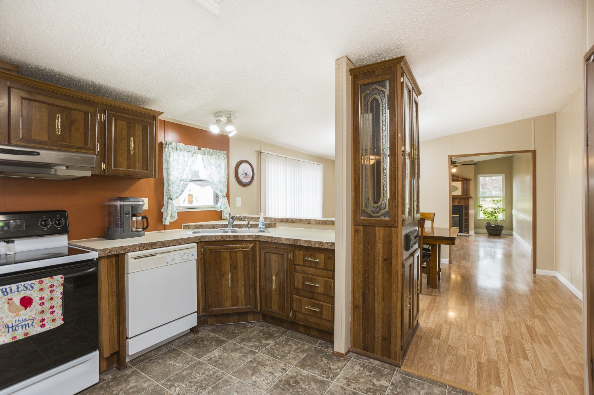 2930 Ray W Road Springfield, TN 37172 - Photo 8 of 25 a kitchen with cabinets and wooden floor
