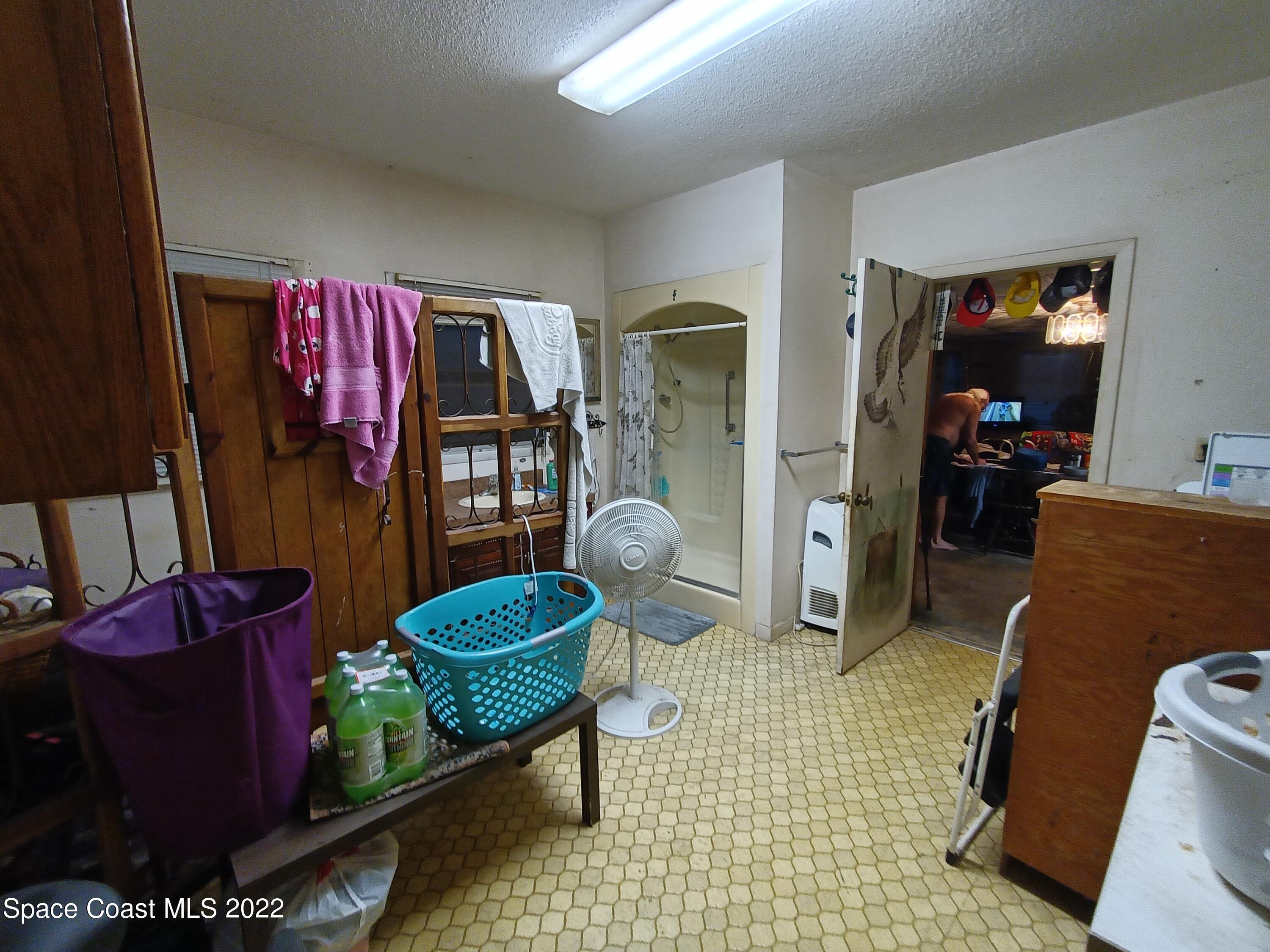 675 Hammock Road Melbourne, FL 32904 - Photo 11 of 16 bath/ laundry