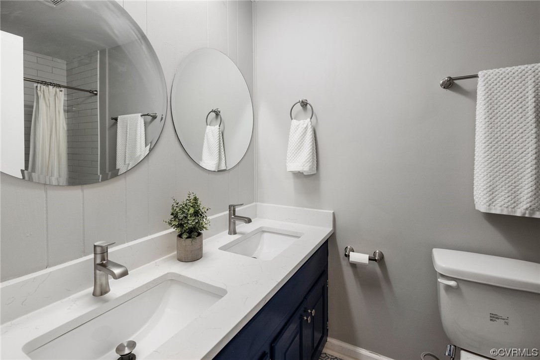 1104 Duckbill Court Midlothian, VA 23113 - Photo 20 of 29 a bathroom with a sink and a mirror