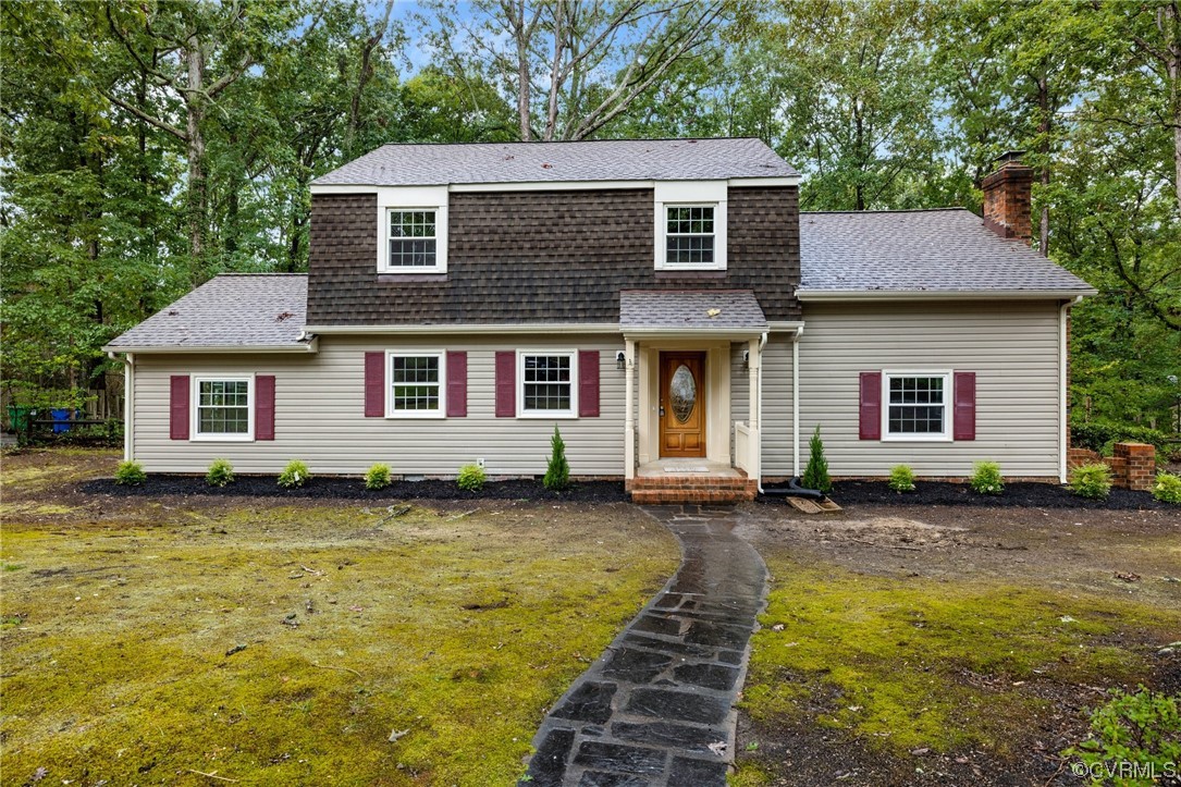 1104 Duckbill Court Midlothian, VA 23113 - Photo 2 of 29 a front view of a house with a garden