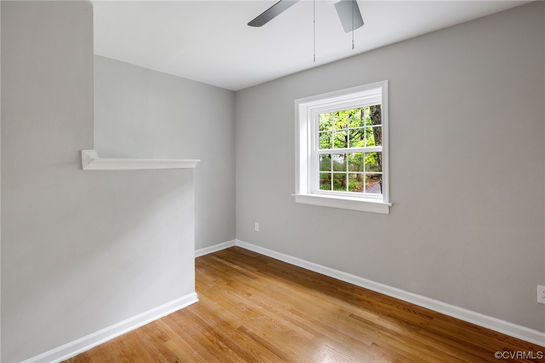 1104 Duckbill Court Midlothian, VA 23113 - Photo 21 of 29 an empty room with wooden floor and windows