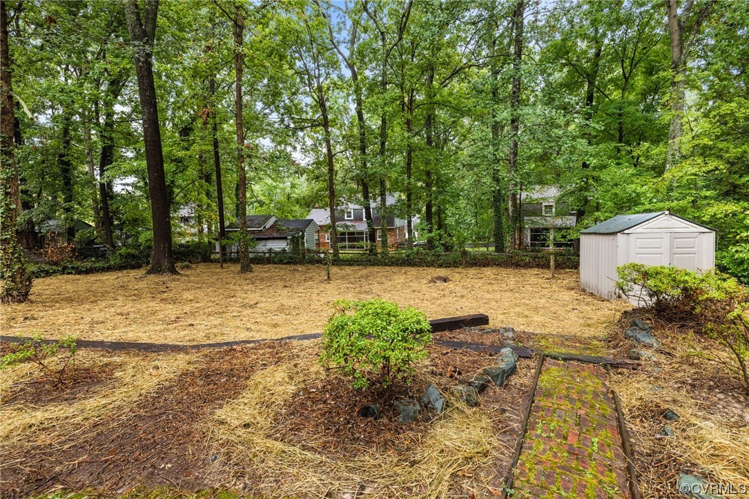 1104 Duckbill Court Midlothian, VA 23113 - Photo 27 of 29 a view of a yard with plants and trees