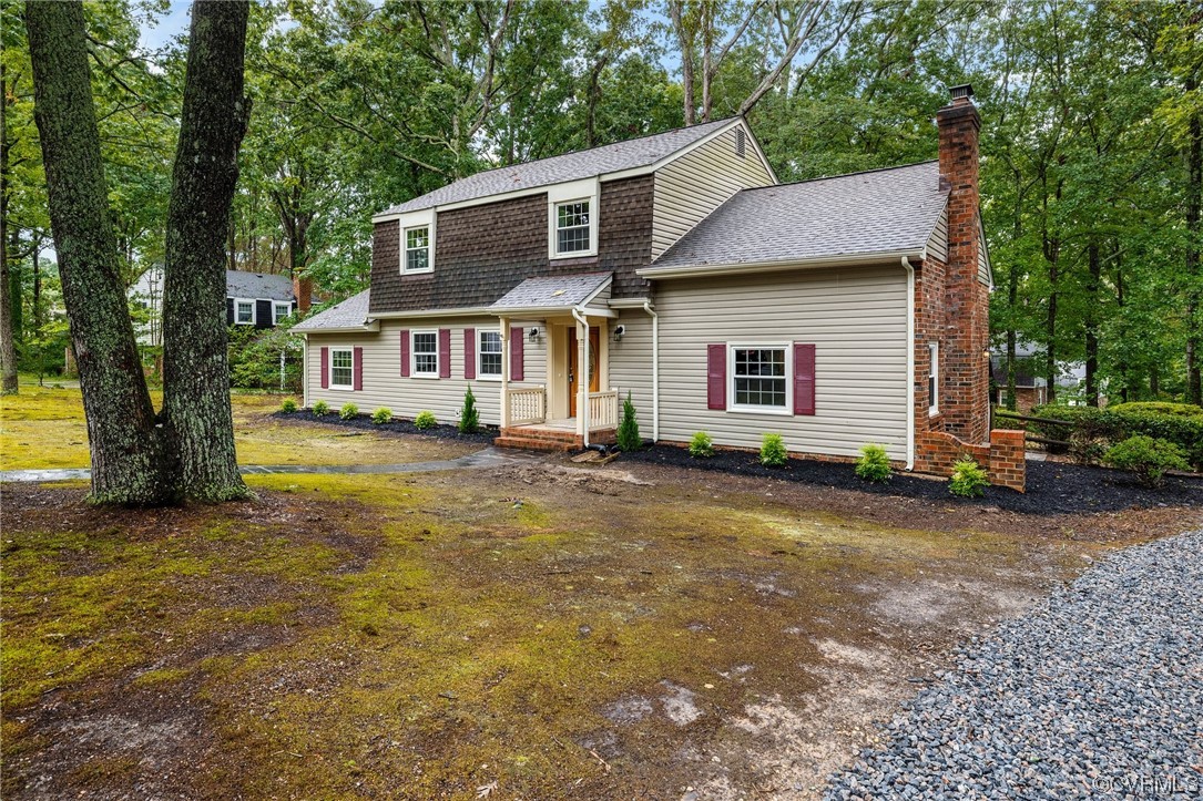 1104 Duckbill Court Midlothian, VA 23113 - Photo 3 of 29 a front view of house with yard and trees