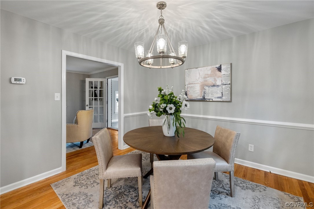 1104 Duckbill Court Midlothian, VA 23113 - Photo 8 of 29 a dining room with a table and chairs