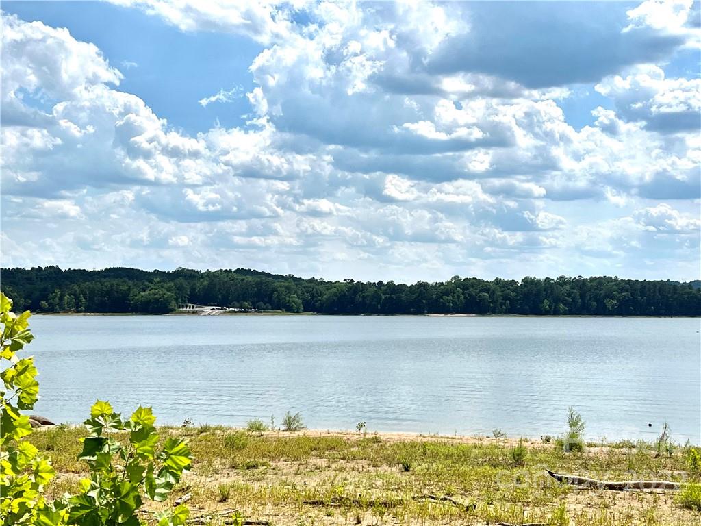 176 North State Lane Rockingham, NC 28379 - Photo 15 of 30 a view of a lake and mountain in the back