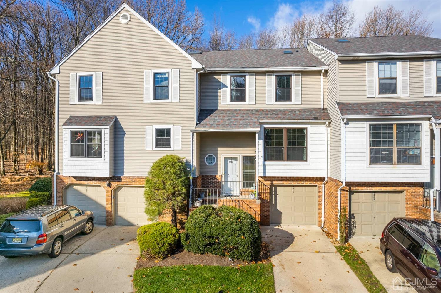 4302 Springbrook Drive Edison, NJ 08820 - Photo 3 of 44 a front view of a house with many windows