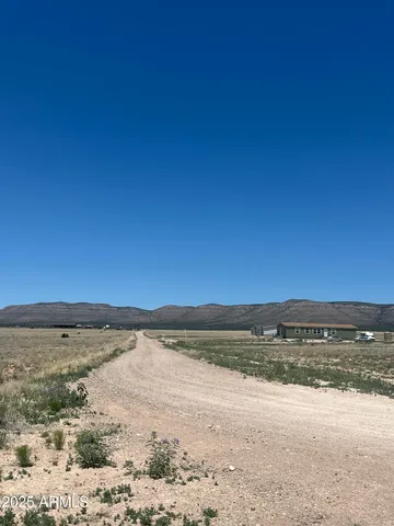 a view of outdoor space and mountain view in back