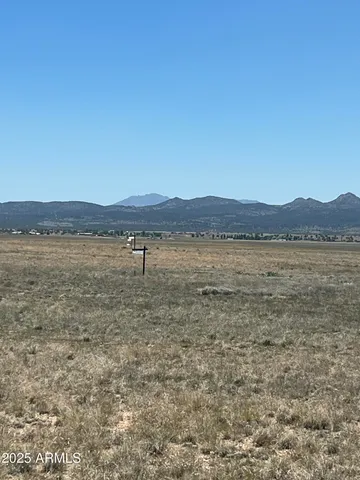 a view of lake with mountain