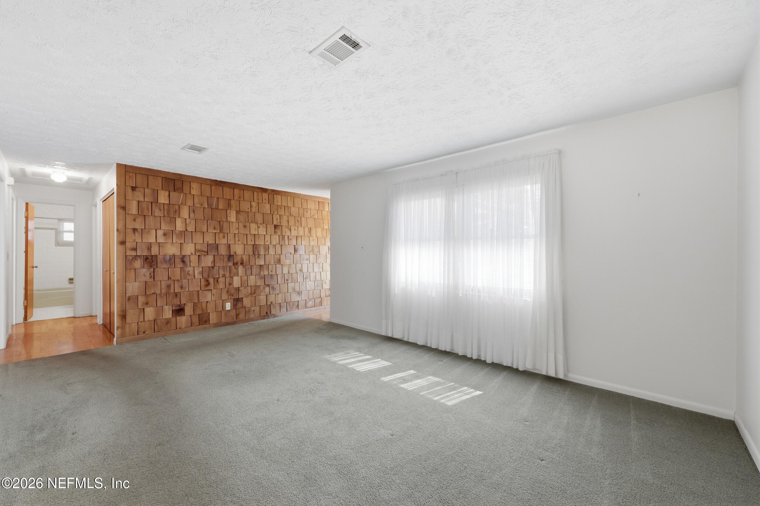 3519 Peoria Road Orange Park, FL 32065 - Photo 14 of 43 an empty room with windows