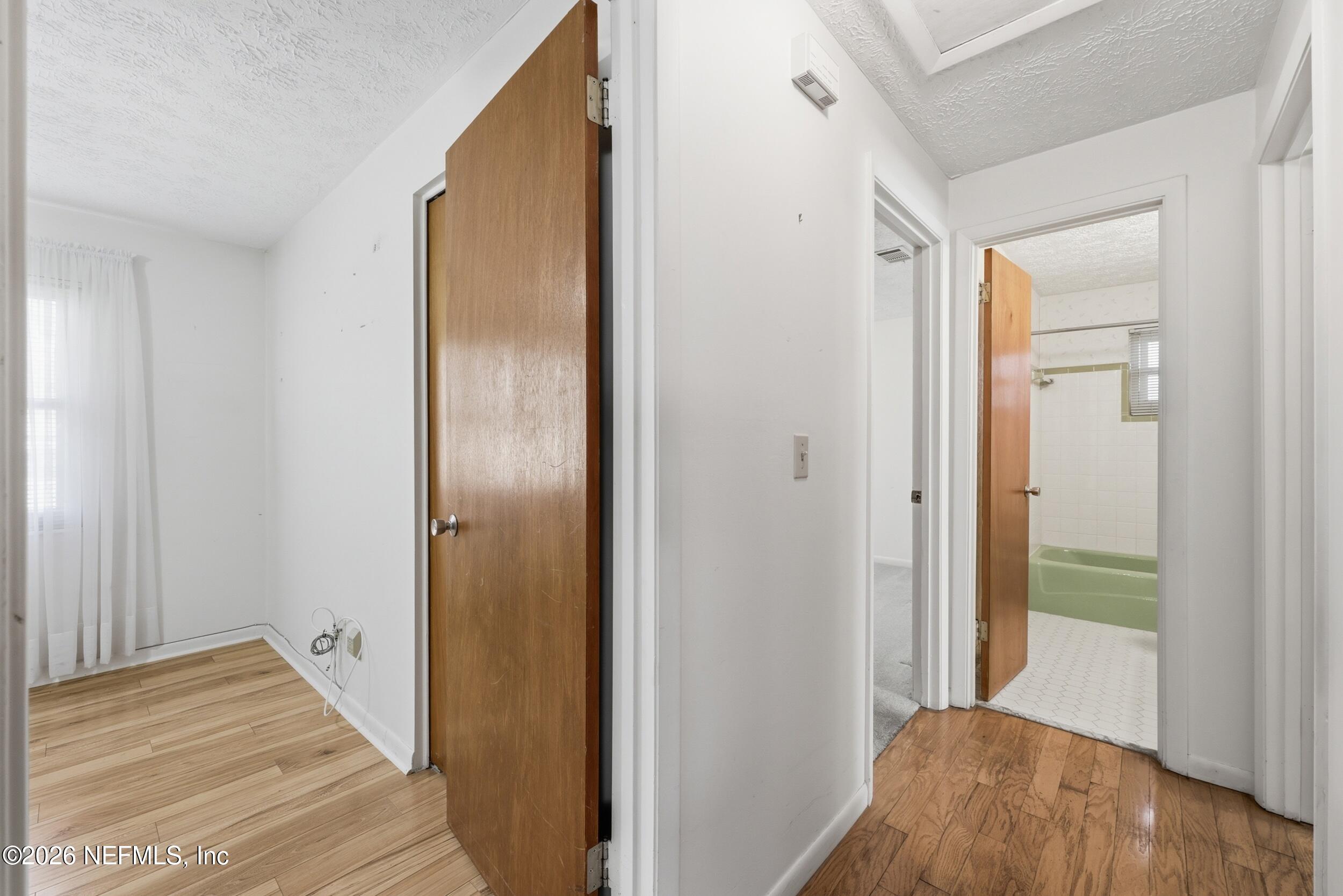 3519 Peoria Road Orange Park, FL 32065 - Photo 19 of 43 a view of a hallway with wooden floor