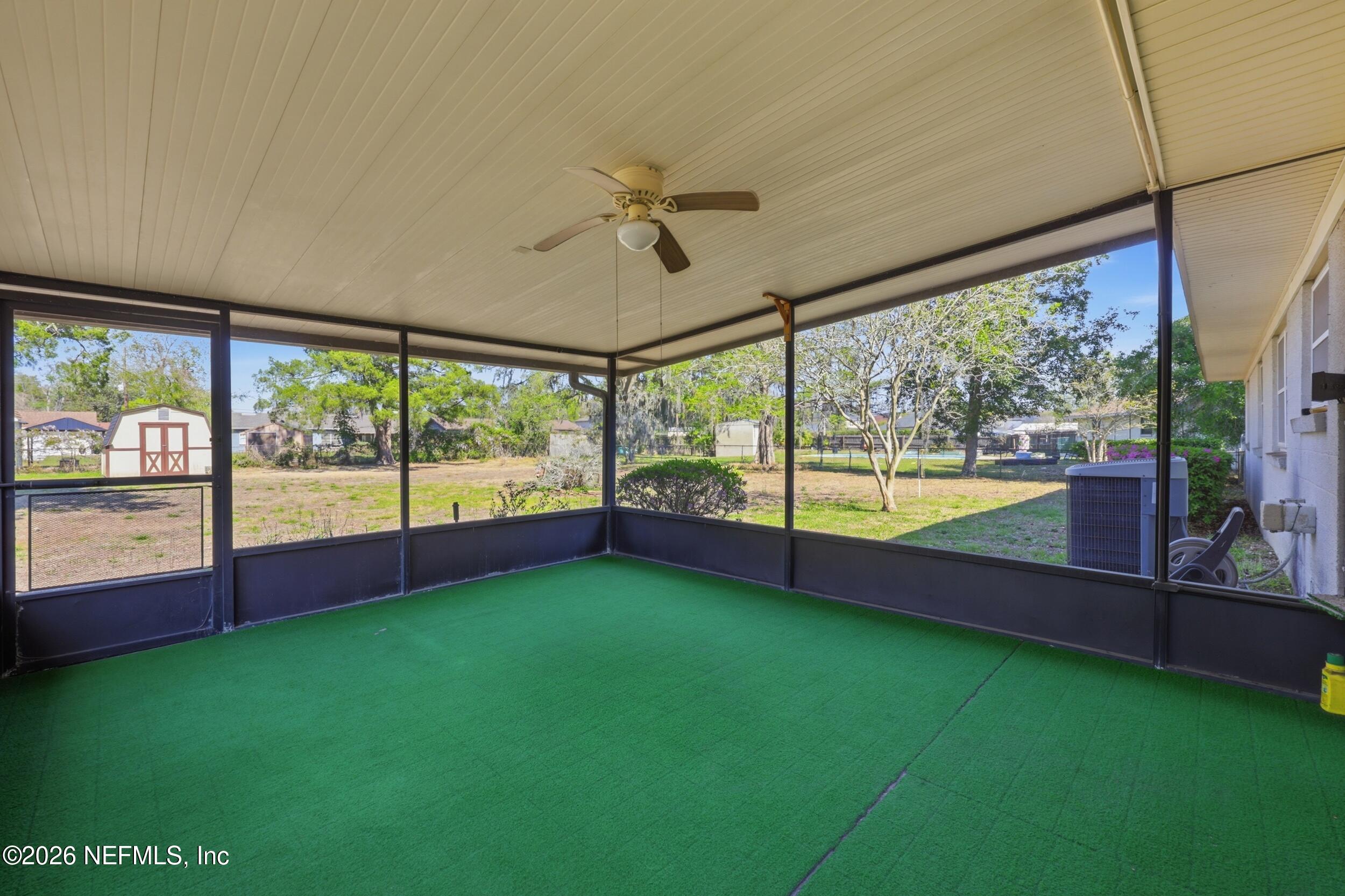 3519 Peoria Road Orange Park, FL 32065 - Photo 31 of 43 a view of an empty room with a large window