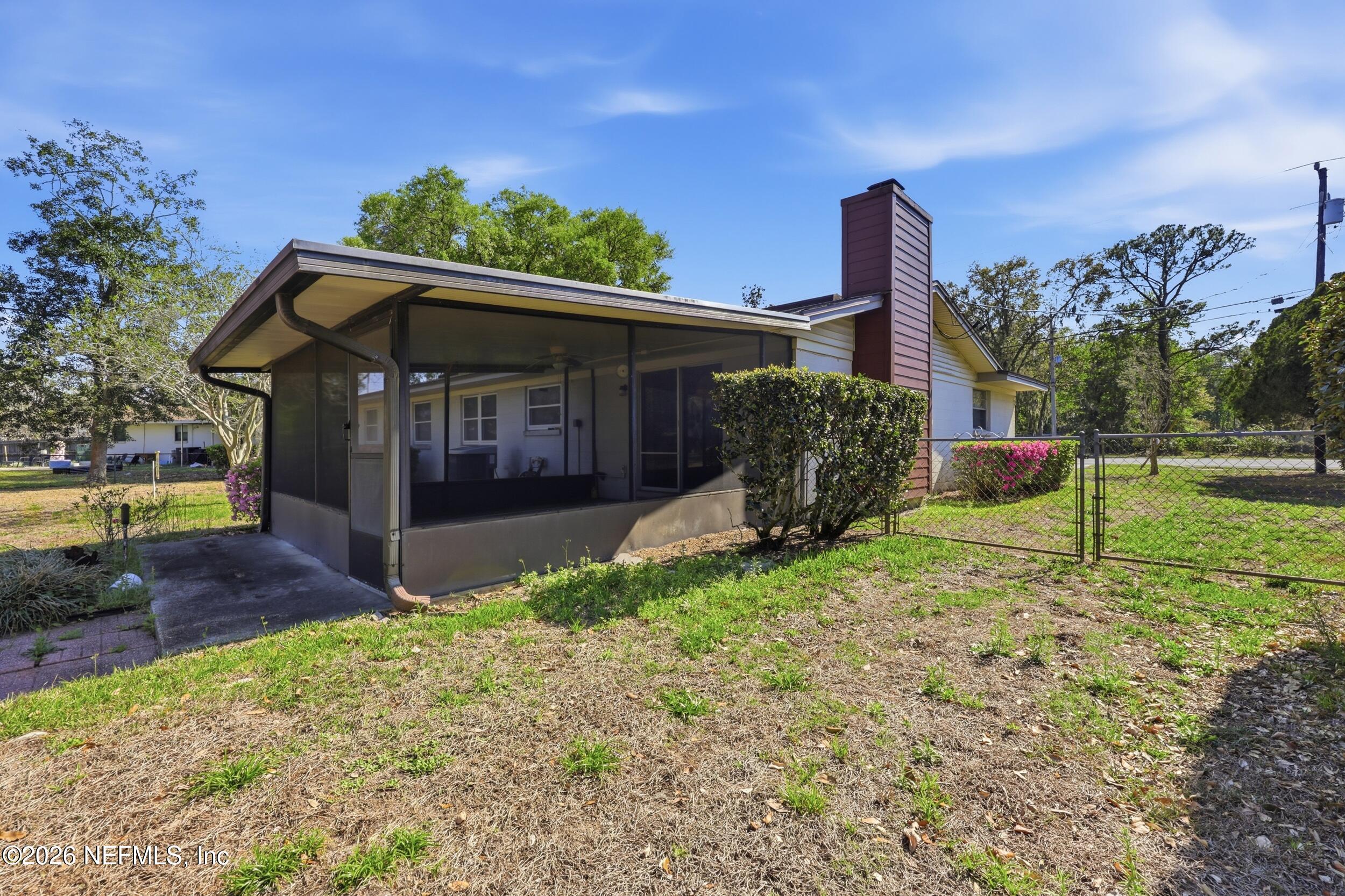 3519 Peoria Road Orange Park, FL 32065 - Photo 33 of 43 a view of a house with a yard