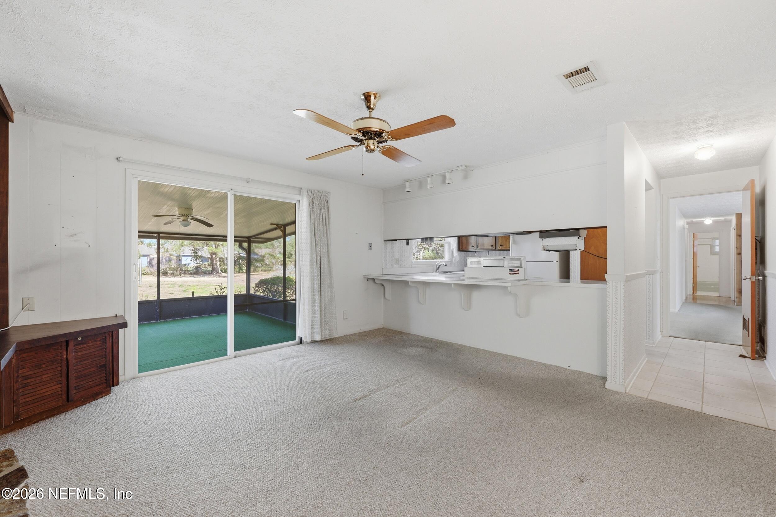 3519 Peoria Road Orange Park, FL 32065 - Photo 5 of 43 a view of an empty room with a window