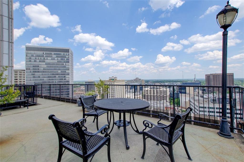 32 Peachtree Street Northwest, Unit 1102 Atlanta, GA 30303 - Photo 16 of 35 a view of a chairs and table in the terrace