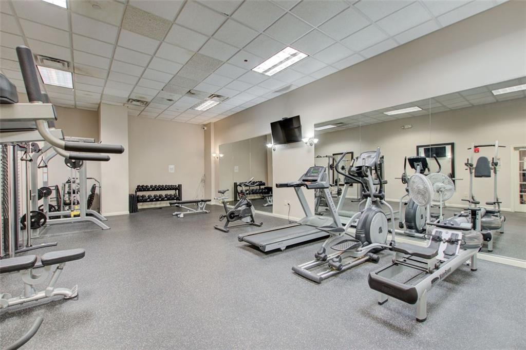 32 Peachtree Street Northwest, Unit 1102 Atlanta, GA 30303 - Photo 4 of 35 a view of a room with gym equipment