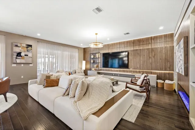 a kitchen with kitchen island white cabinets and white appliances