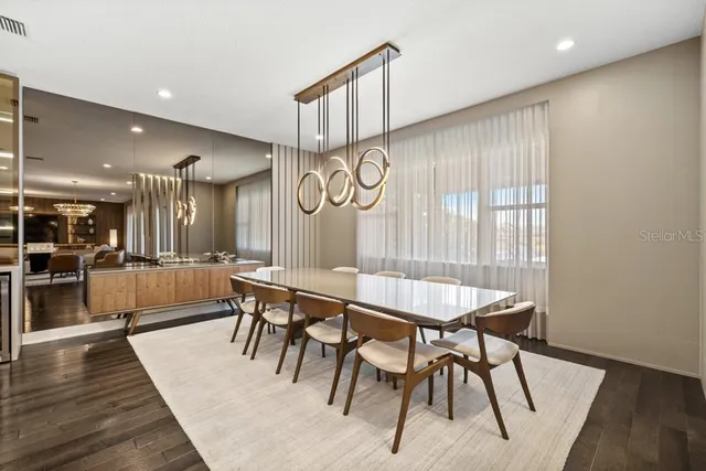 a spacious bedroom with a bed and a couch