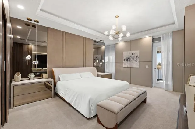 a view of a swimming pool with a table and chairs