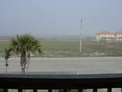 15010 Leeward Drive, Unit 4205 Corpus Christi, TX 78418 - Photo 3 of 3 a view of a lake