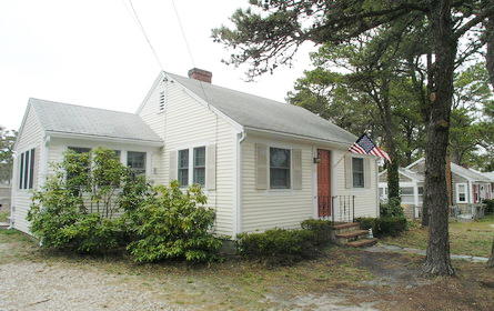 41 Longell Road Dennis Port, MA 02639 - Photo 14 of 14 a view of a house with a yard