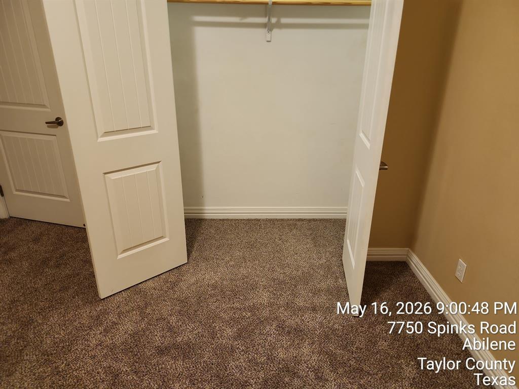 7750 Spinks Road Abilene, TX 79603 - Photo 10 of 15 an entryway door with a hallway