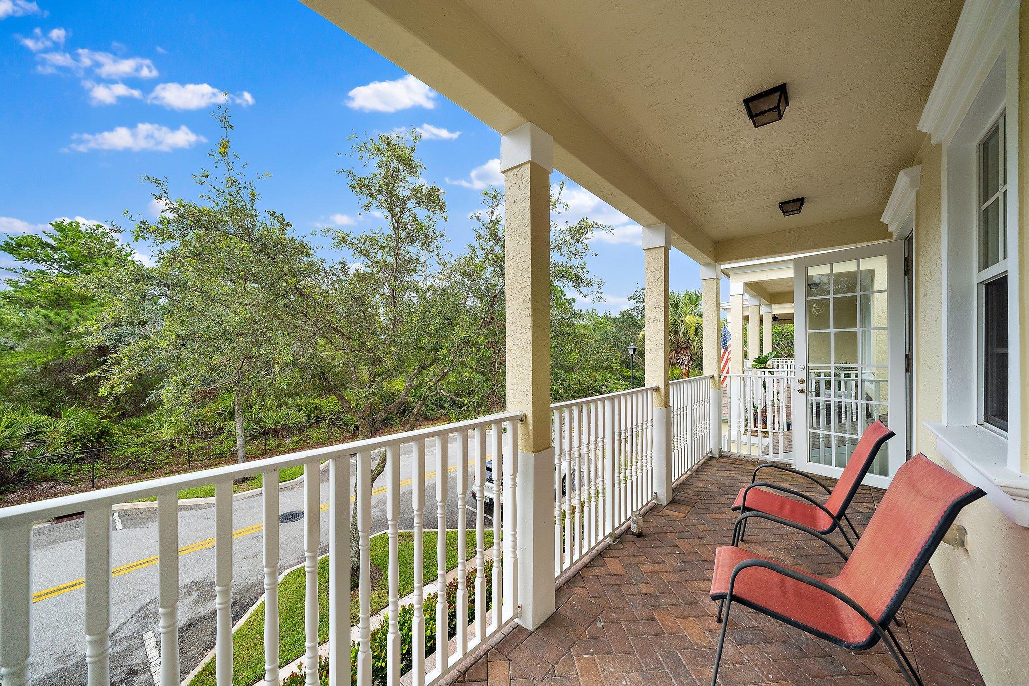 110 Sea Plum Drive, Unit 103 Jupiter, FL 33458 - Photo 5 of 31 a view of a porch with furniture