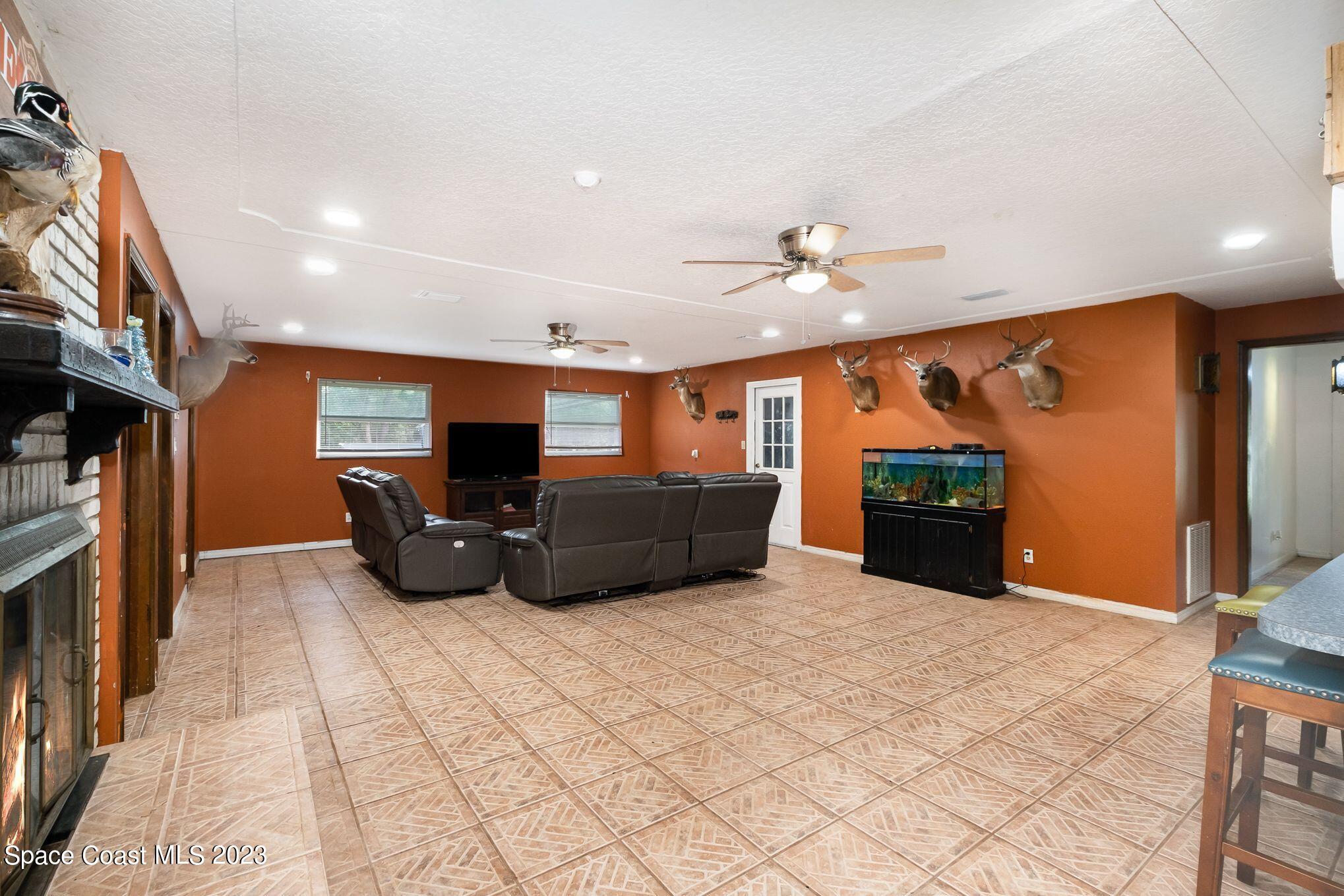 2160 Valkaria Road Malabar, FL 32950 - Photo 26 of 36 Living Room 2