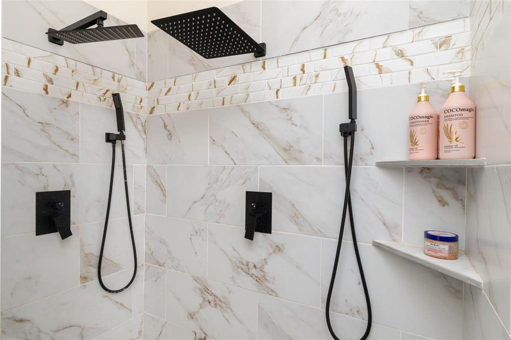 5543 Gray Road Nocona, TX 76255 - Photo 17 of 36 a bathroom with a shower